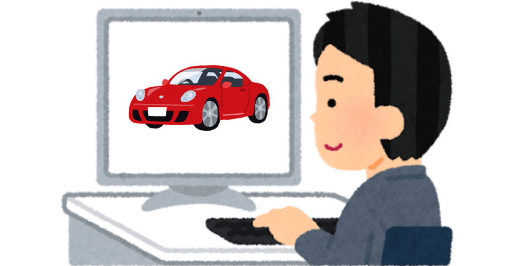 中古車をパソコンで見ている男性